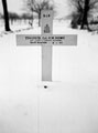 The grave of Corporal Robert Howe, 3rd/4th County of London Yeomanry (Sharpshooters), killed in action, Wanssum, 8 January 1945
