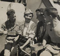 Men of No 2 Commando drinking tea with a Yugoslav partisan, 1944