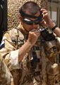 A member of 216 Signals Squadron prepares to leave on a patrol from his base at Lashkar Gah