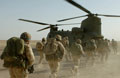 Soldiers boarding a CH47 Chinook helicopter on completion of their mission near Musa Qala, Afghanistan, 2006
