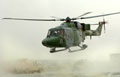An Army Lynx helicopter leaves Lashkar Gah after picking up passengers, Afghanistan, 2006