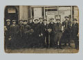 Recruits standing outside a recruiting office, 1914 (c)