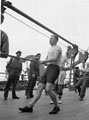'Tug of war. Reg Newland', 3rd County of London Yeomanry (Sharpshooters) on board HMT Orion en route to Egypt, 1941