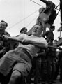 'Tug of War. Jimmy Sale', 3rd County of London Yeomanry (Sharpshooters) on board HMT Orion en route to Egypt, 1941