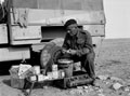 Sub-Conductor Mayland, Royal Army Service Corps, preparing rations in the desert, 1941