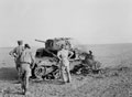 Inspecting a knocked-out Italian M13 tank, 1942