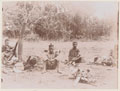 Gold Coast Regiment Battery resting outside a village, 1909 (c)