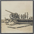 Unloading a 5-inch howitzer from a barge, Mesopotamia, 1916