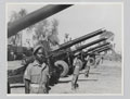 Gunners from 1st Medium Regiment, Indian Artillery, next to their guns, February 1946