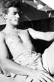 Tank crewman bothered by flies, North Africa, 1942 (c)