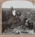 'Bombing the Germans out of their deep dugouts at Martinpaich during our advance on the Somme', 1916