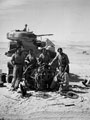 Members of 3rd County of London Yeomanry work on the engine of an M3 Grant tank, Egypt, 1943
