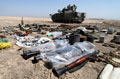 British soldiers uncover a haul of insurgent weapons and equipment, Basra, Iraq, 2006