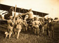 Testing the parachute harness before the drop at Grossa aerodrome, 26 June 1918