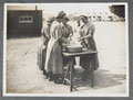 Women's Army Auxiliary Corps personnel peeling potatoes, 1917 (c)