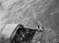 'Capt. Jago coming alongside Orion to visit his father. Lt Col Jago, MM, TD', 1941
