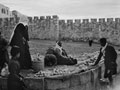 'Selling oranges by the Damascus Gate (3 for 1d)', Jerusalem, Palestine, 1943