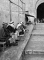 'Arabs smoking & resting. Damascus Gate', Jerusalem, Palestine, 1943