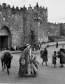 'Damascus Gate. Arab & boy porters', Jerusalem, Palestine, 1943