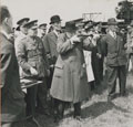 Prime Minister Winston Churchill aiming a Sten gun during a visit to the Experimental Establishment, Shoeburyness, June 1941