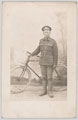 Soldier of the 55th Company, Chinese Labour Corps, posing with a bicycle in France, 1918 (c)