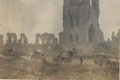 Ambulances in front of the ruined Cloth Hall, Ypres, 1915 (c)