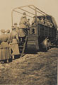 Members of First Aid Nursing Yeomanry climbing on to a truck, 1914-1918 (c)