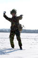 A member of The Light Dragoons takes deadly aim with a snowball, Robertson Barracks, Norfolk, March 2004