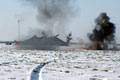 Air and artillery strikes on a camouflaged position in the snow, during an exercise at Robertson Barracks, Norfolk, March 2004