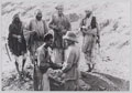 Major M C Holmes conferring with Afridi tribesmen, 1930 (c)
