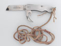Clasp knife attached to a piece of string, 1981 (c)