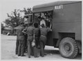 Recently freed British prisoners of war making use of NAAFI facilities at Britannia Camp, near Seoul, Korea, 1953 (c)