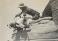 Staged scene of combat with a British soldier with a pistol overpowering a North West Frontier tribesman, 1937