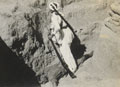 Staged scene of combat with a North West Frontier tribesman standing over a 'dead' British soldier, 1937