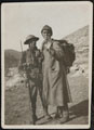A British soldier with a captured Turkish sniper, 30 December 1917