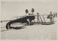 British forces inspect an upside down Sopwith Camel, crashed on a beach in Palestine October 1917