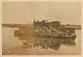A ferry transporting a railway engine along the Suez Canal, Egypt, 1916