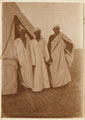 Volunteers of the Egyptian Labour Force outside a tent in the desert, Egypt, 1916 (c) 