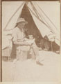 British soldiers resting and reading letters in their tent, Palestine, 1917 (c)