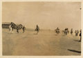 British soldiers racing donkeys in the desert, 1916 (c)