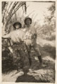 Two British soldiers smoking pipes in the desert, 1916 (c)