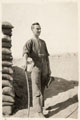 A British soldier posing with a cane, 1916 (c)