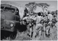 Members of 4th (Uganda) Battalion, King's African Rifles, next to a Bedford truck 1956-1957 (c)