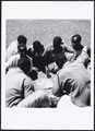 Off-duty 4th (Uganda) Battalion, King's African Rifles askaris playing Ludo, 1956-1957 (c)