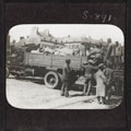 Chinese labourers loading meat on to a truck, 1917 (c)