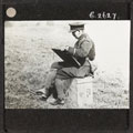 Second Lieutenant Muirhead Bone sketching Becordel, 21 September 1916