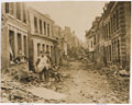 British soldiers in a war-damaged street in Bapaume, 1918
