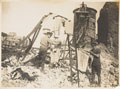 Troops billeted in a wrecked factory hanging out their washing, Bapaume, 8 March 1918