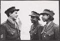 Two women from the West Indies serving in the Auxiliary Territorial Service (ATS) in Britain, talking to their sergeant
