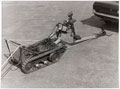 Wheelbarrow Mark 7 Explosive Ordnance Disposal (EOD) vehicle deploying its hook, 1974